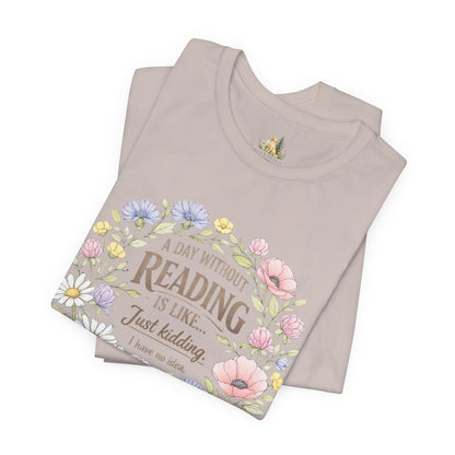 Reading Lover T-Shirt — “A Day Without Reading Is Like… Just Kidding” Floral Book Tee