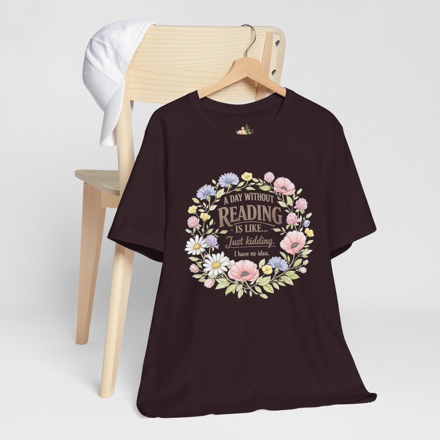 Reading Lover T-Shirt — “A Day Without Reading Is Like… Just Kidding” Floral Book Tee