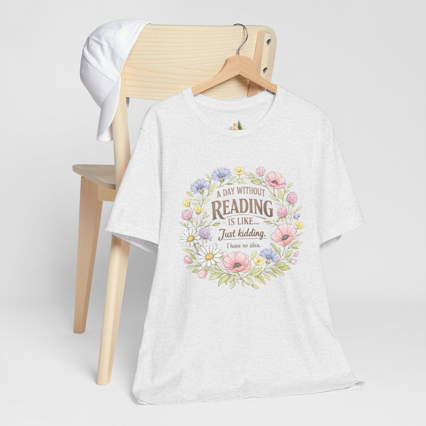 Reading Lover T-Shirt — “A Day Without Reading Is Like… Just Kidding” Floral Book Tee
