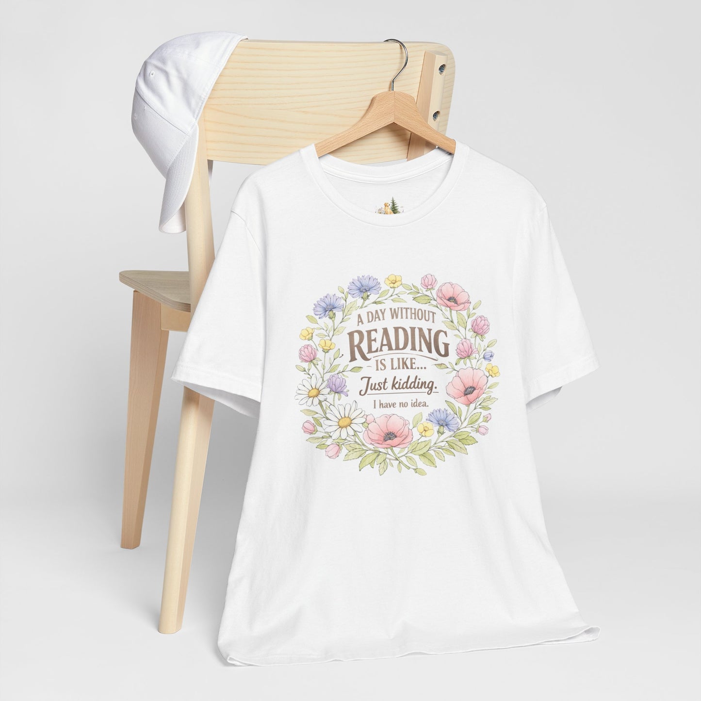 Reading Lover T-Shirt — “A Day Without Reading Is Like… Just Kidding” Floral Book Tee