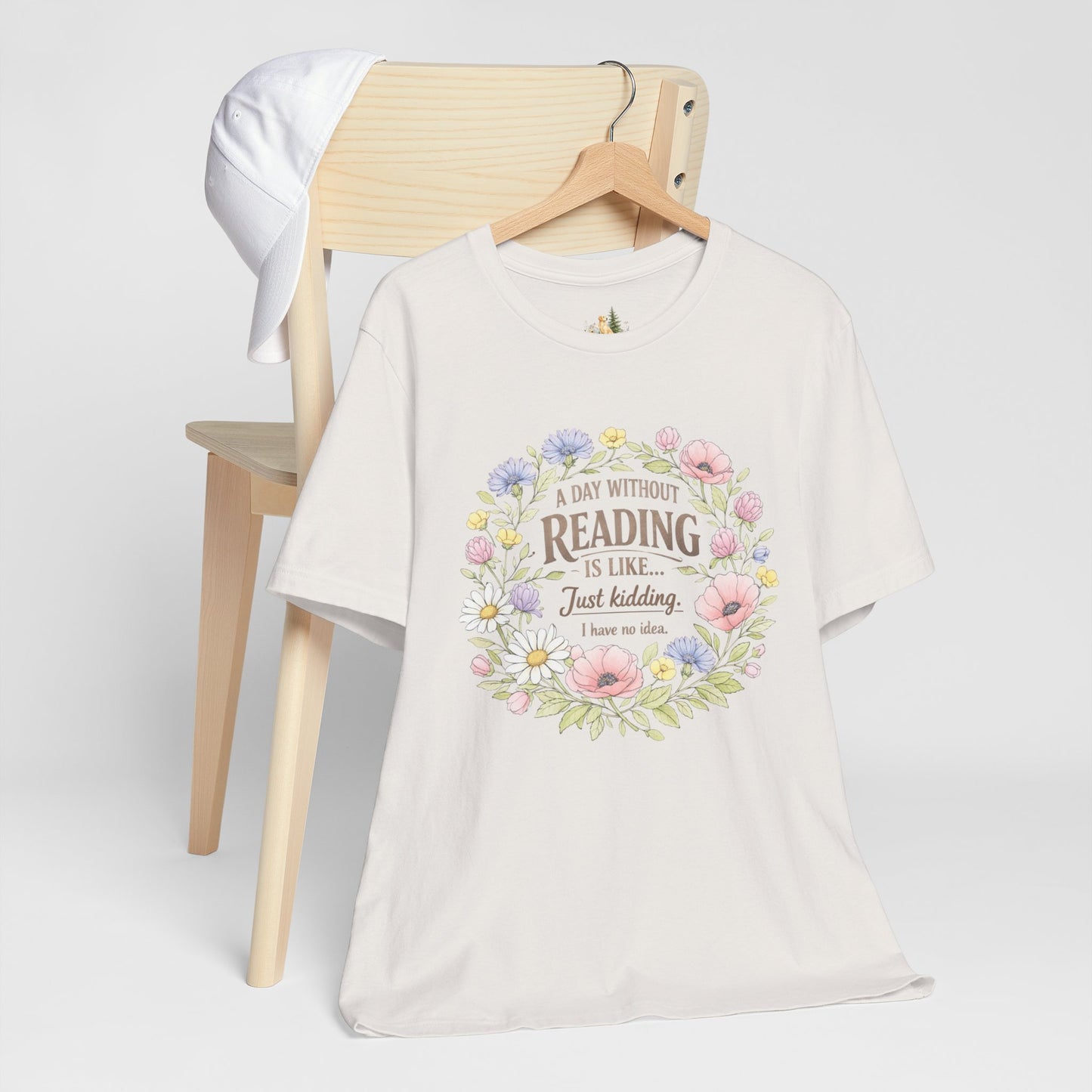 Reading Lover T-Shirt — “A Day Without Reading Is Like… Just Kidding” Floral Book Tee