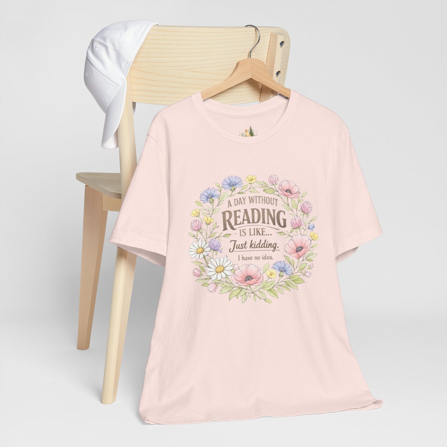 Reading Lover T-Shirt — “A Day Without Reading Is Like… Just Kidding” Floral Book Tee