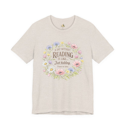Reading Lover T-Shirt — “A Day Without Reading Is Like… Just Kidding” Floral Book Tee